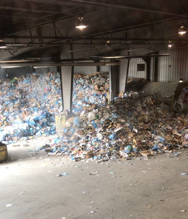 A scene from the Edmonton Waste Management Centre with messy recyclables.